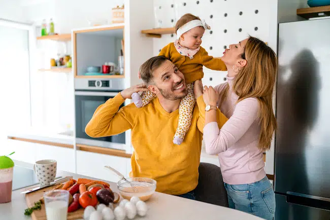 happy-family-preparing-healthy-food-together-in-ki-2021-08-31-09-45-12-utc.jpg