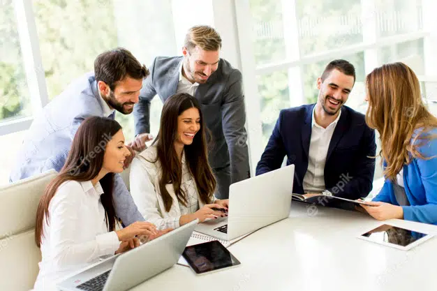 startup-business-team-meeting-modern-bright-office-interior-working-laptop_52137-1199.jpeg